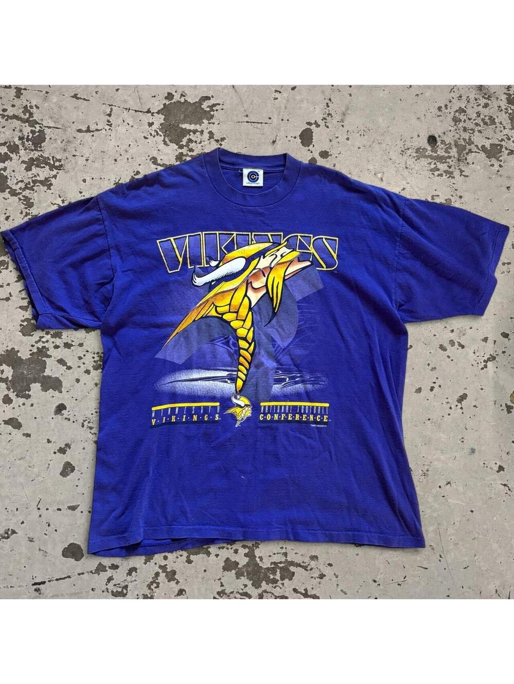 Vintage 1994 Minnesota Vikings NFL Football T-Shirt with yellow Viking graphic